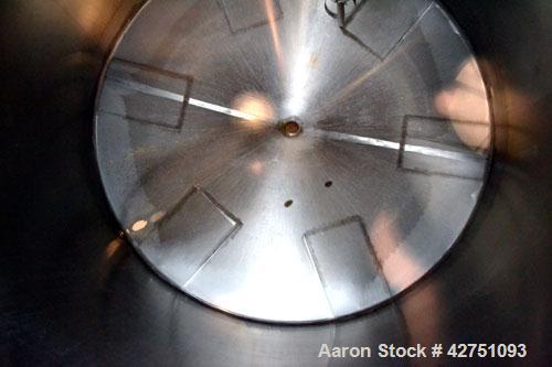Used Perma-San Tank, 2000 Gallon, Model CVC, 316 Stainless Steel Vertical. 84” Diameter x 80” straight side. Dished top, coned bottom. Off center top entering Lightnin air operated agitator, model XJ...