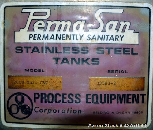 Used Perma-San Tank, 2000 Gallon, Model CVC, 316 Stainless Steel Vertical. 84” Diameter x 80” straight side. Dished top, coned bottom. Off center top entering Lightnin air operated agitator, model XJ...