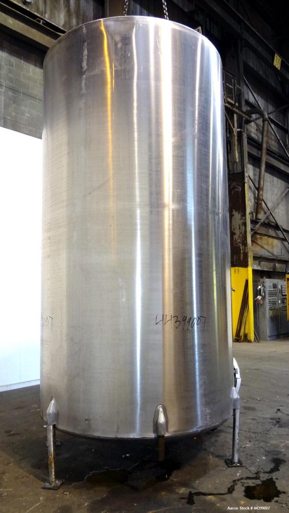 Used Perma-San Tank, 3000 Gallon, 304 Stainless Steel, Vertical.  Approximately 80" diameter x 143" straight side, flat welded top, dished bottom.  Side bottom entering agitator with a 3 blade prop, ...