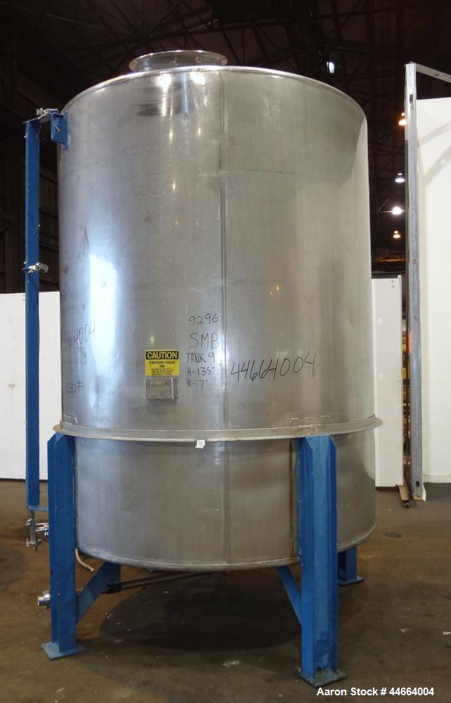 Used Perry Products Tank, 1850 Gallons, 304 Stainless Steel, Vertical. 78" Diameter x 96" straight side, cone top and bottom. Side bottom entering agitator with a (3) blade prop driven by a 5 hp, 3/6...
