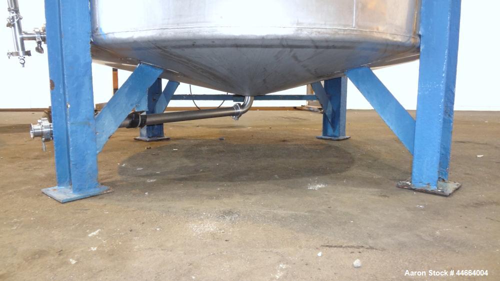 Used Perry Products Tank, 1850 Gallons, 304 Stainless Steel, Vertical. 78" Diameter x 96" straight side, cone top and bottom. Side bottom entering agitator with a (3) blade prop driven by a 5 hp, 3/6...