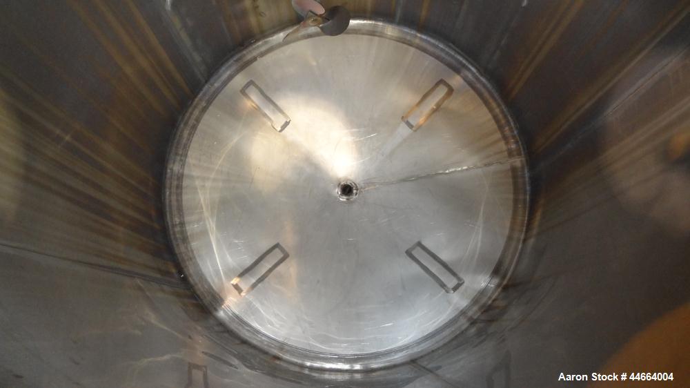 Used Perry Products Tank, 1850 Gallons, 304 Stainless Steel, Vertical. 78" Diameter x 96" straight side, cone top and bottom. Side bottom entering agitator with a (3) blade prop driven by a 5 hp, 3/6...