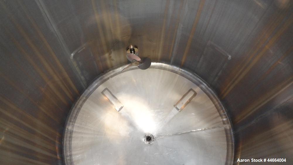 Used Perry Products Tank, 1850 Gallons, 304 Stainless Steel, Vertical. 78" Diameter x 96" straight side, cone top and bottom. Side bottom entering agitator with a (3) blade prop driven by a 5 hp, 3/6...