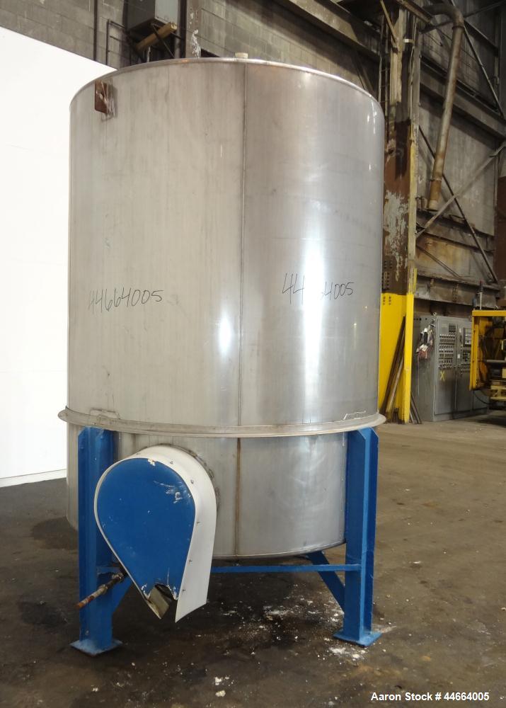 Used Tank, 2000 Gallons, 304 Stainless Steel, Vertical. 78" Diameter X 96" straight side, cone top and bottom. Side bottom entering agitator with a (3) blade prop driven by a 3 hp, 3/60/230/460 volt,...