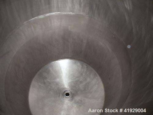 Used Perry Products Tank, 2000 Gallon, 304 stainless steel, vertical. 76" diameter x 106" straight side, dished top and bottom. Openings: top (2) 3" tri-clamp, 4" vent, 8" drive (capped), (2) 24" man...