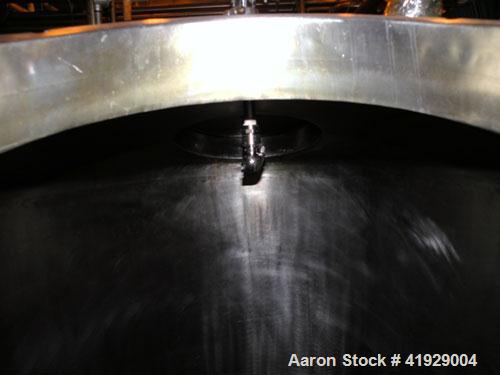 Used Perry Products Tank, 2000 Gallon, 304 stainless steel, vertical. 76" diameter x 106" straight side, dished top and bottom. Openings: top (2) 3" tri-clamp, 4" vent, 8" drive (capped), (2) 24" man...