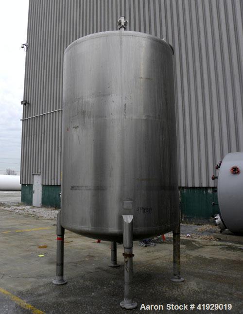 Used Perry Products Tank, 2000 Gallon, 316 Stainless Steel, Vertical. 76" diameter x 108" straight side, dished top and bottom. (1) Spray ball. Openings top (2) 3" tri-clamp, 4" vent, 8" drive (cappe...