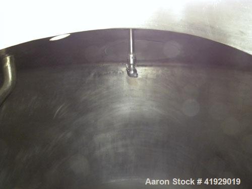 Used Perry Products Tank, 2000 Gallon, 316 Stainless Steel, Vertical. 76" diameter x 108" straight side, dished top and bottom. (1) Spray ball. Openings top (2) 3" tri-clamp, 4" vent, 8" drive (cappe...