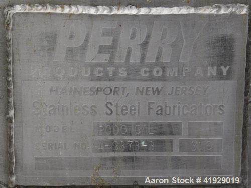 Used Perry Products Tank, 2000 Gallon, 316 Stainless Steel, Vertical. 76" diameter x 108" straight side, dished top and bottom. (1) Spray ball. Openings top (2) 3" tri-clamp, 4" vent, 8" drive (cappe...
