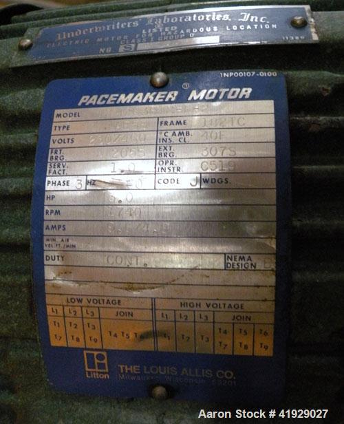 Used Perry Products Tank, 2000 Gallon, 304 stainless steel, vertical. 76" diameter x 106" straight side, dished top and bottom.  Off center top entering angled Lightnin manual variable speed agitator...