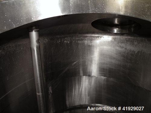 Used Perry Products Tank, 2000 Gallon, 304 stainless steel, vertical. 76" diameter x 106" straight side, dished top and bottom.  Off center top entering angled Lightnin manual variable speed agitator...