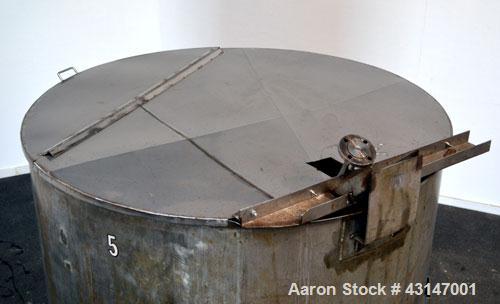 Used Pfaudler Permutit Canada Tank, 1000 Imperial Gallons (1200 US Gallons), 304 Stainless Steel, Vertical. 68’’ Diameter x 70’’ straight side. Flat open top with a 1 piece 1/4 hinged cover, dished b...