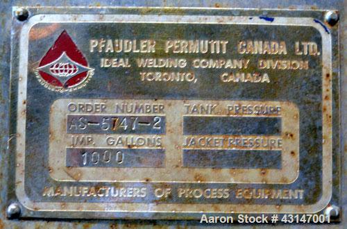 Used Pfaudler Permutit Canada Tank, 1000 Imperial Gallons (1200 US Gallons), 304 Stainless Steel, Vertical. 68’’ Diameter x 70’’ straight side. Flat open top with a 1 piece 1/4 hinged cover, dished b...