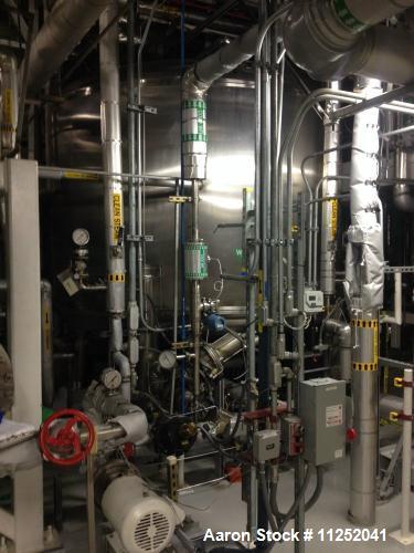 Used Stainless Steel 4,300 Gallon Insulated Storage Tank. 304 stainless steel construction, manufactured by Precision Stainless, Inc. Measures 10' diameter x 8' high, dished top and bottom. Vessel is...