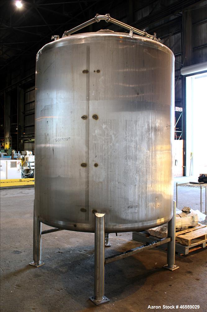 Used Precision Stainless Mixing Tank, 1,500 Gallon, 316 Stainless Steel, Vertical. Approximate 74" diameter x 80" straight side. Dished top, cone Bottom. Top entering Lightnin agitator, model N33G 30...