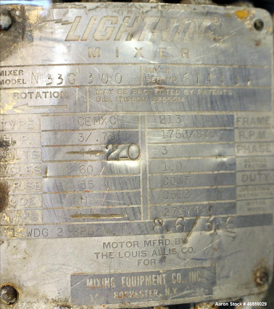 Used Precision Stainless Mixing Tank, 1,500 Gallon, 316 Stainless Steel, Vertical. Approximate 74" diameter x 80" straight side. Dished top, cone Bottom. Top entering Lightnin agitator, model N33G 30...