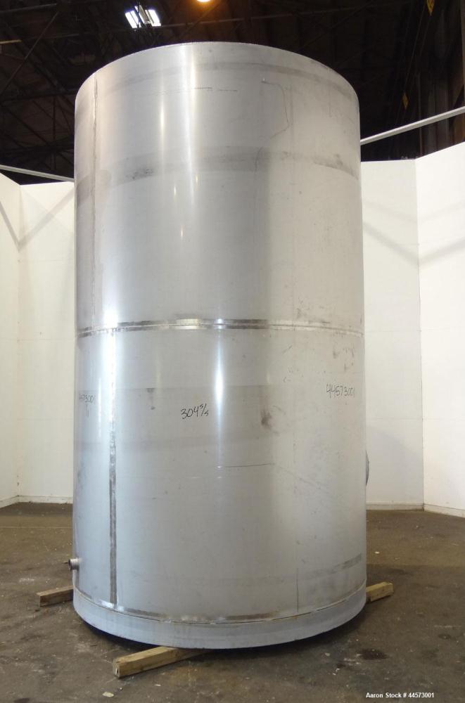 Used REC Industries Tank, 3965 Gallon, 304 Stainless Steel, Vertical, Model 3000.90.144.S.T4.  Approximately 90" diameter x 144" straight side, cone top, flat bottom.  Openings:  top 3-1/2" threaded,...