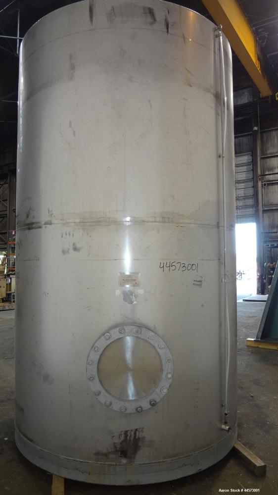 Used REC Industries Tank, 3965 Gallon, 304 Stainless Steel, Vertical, Model 3000.90.144.S.T4.  Approximately 90" diameter x 144" straight side, cone top, flat bottom.  Openings:  top 3-1/2" threaded,...