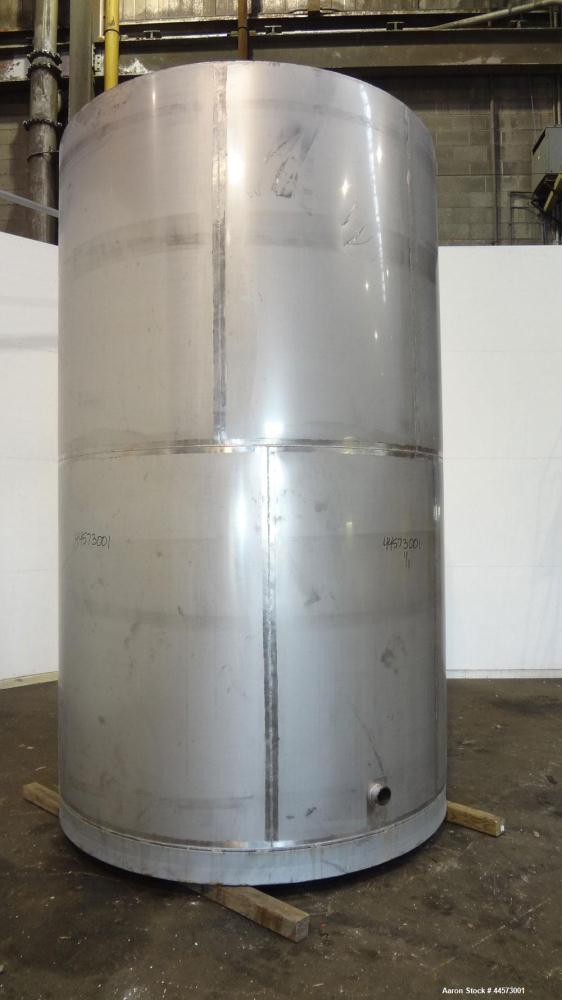 Used REC Industries Tank, 3965 Gallon, 304 Stainless Steel, Vertical, Model 3000.90.144.S.T4.  Approximately 90" diameter x 144" straight side, cone top, flat bottom.  Openings:  top 3-1/2" threaded,...