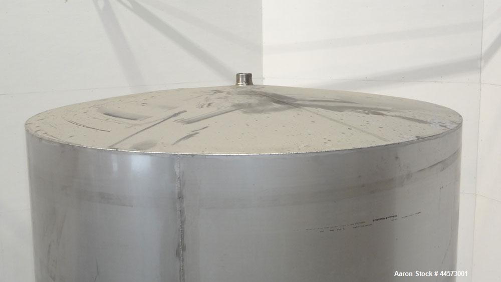 Used REC Industries Tank, 3965 Gallon, 304 Stainless Steel, Vertical, Model 3000.90.144.S.T4.  Approximately 90" diameter x 144" straight side, cone top, flat bottom.  Openings:  top 3-1/2" threaded,...