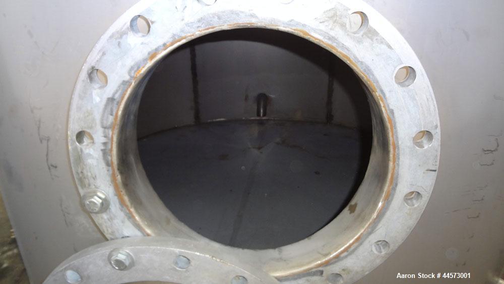 Used REC Industries Tank, 3965 Gallon, 304 Stainless Steel, Vertical, Model 3000.90.144.S.T4.  Approximately 90" diameter x 144" straight side, cone top, flat bottom.  Openings:  top 3-1/2" threaded,...