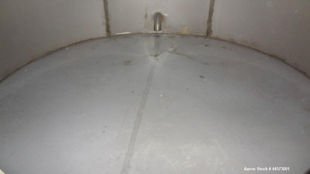 Used REC Industries Tank, 3965 Gallon, 304 Stainless Steel, Vertical, Model 3000.90.144.S.T4.  Approximately 90" diameter x 144" straight side, cone top, flat bottom.  Openings:  top 3-1/2" threaded,...