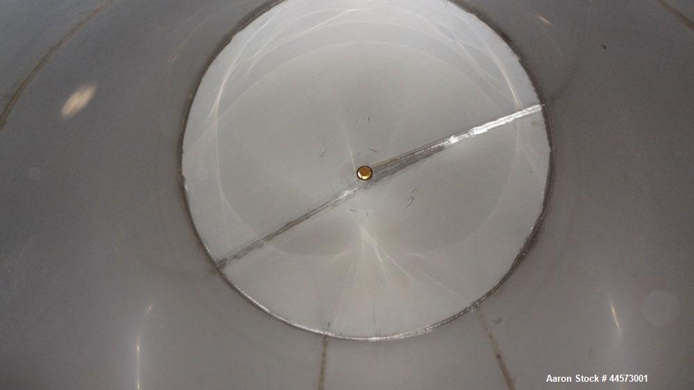 Used REC Industries Tank, 3965 Gallon, 304 Stainless Steel, Vertical, Model 3000.90.144.S.T4.  Approximately 90" diameter x 144" straight side, cone top, flat bottom.  Openings:  top 3-1/2" threaded,...