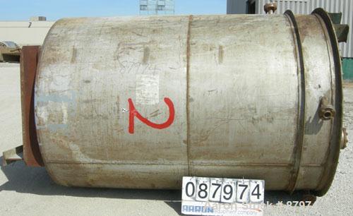 Used R.D. Cole Manufacturing Tank, 2300 gallon, 304 stainless steel, vertical. 78" diameter x 114" straight side, flat top with a bolt on cover with a 18'' x 36'' hinged cover, flat bottom. Carbon st...