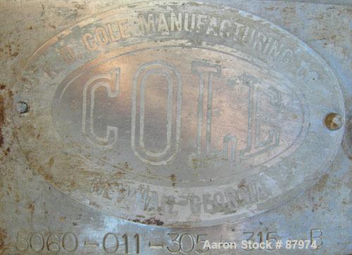 Used R.D. Cole Manufacturing Tank, 2300 gallon, 304 stainless steel, vertical. 78" diameter x 114" straight side, flat top with a bolt on cover with a 18'' x 36'' hinged cover, flat bottom. Carbon st...