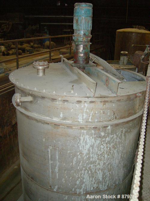 Used R.D. Cole Manufacturing Tank, 2300 gallon, 304 stainless steel, vertical. 78" diameter x 114" straight side, flat top with a bolt on cover with a 18'' x 36'' hinged cover, flat bottom. Carbon st...