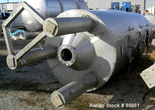 USED: Reimelt pressure tank, 1849 gallon (7000 liter), 304 stainless steel, vertical. 64" diameter x 138" straight side, dished top, coned bottom. Internal rated 13 psi at 122 deg F. (6) Side enterin...