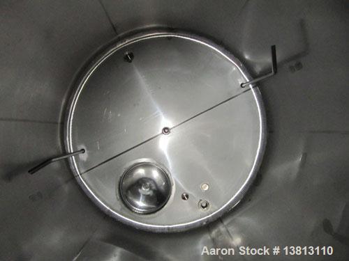 Used-Sani Tank Stainless Steel Storage Tank, 3,000 Gallons.  3" Bottom discharge, top manway, 6 inlets:  (2) 2.5", (3) 3.5" ...