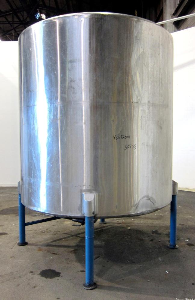 Used San-I-Tank, 2000 Gallon, 304 Stainless Steel, Vertical. 84” Diameter x 84” straight side, flat welded top, coned bottom. Lightnin clamp on agitator, model D-3. Approximate 1” diameter shaft with...