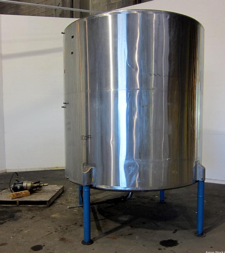 Used San-I-Tank, 2000 Gallon, 304 Stainless Steel, Vertical. 84” Diameter x 84” straight side, flat welded top, coned bottom. Lightnin clamp on agitator, model D-3. Approximate 1” diameter shaft with...