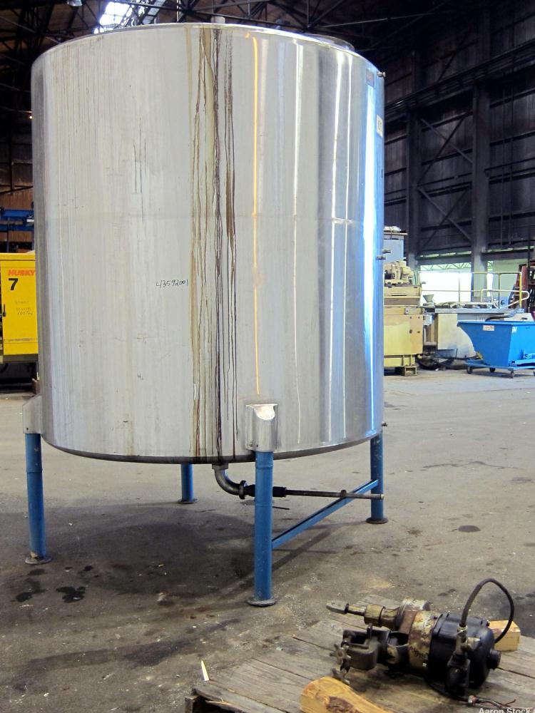 Used San-I-Tank, 2000 Gallon, 304 Stainless Steel, Vertical. 84” Diameter x 84” straight side, flat welded top, coned bottom. Lightnin clamp on agitator, model D-3. Approximate 1” diameter shaft with...