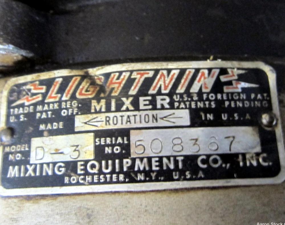 Used San-I-Tank, 2000 Gallon, 304 Stainless Steel, Vertical. 84” Diameter x 84” straight side, flat welded top, coned bottom. Lightnin clamp on agitator, model D-3. Approximate 1” diameter shaft with...