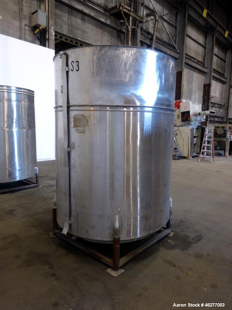 Used- Tank, Approximately 1,000 Gallons, 304 Stainless Steel, Vertical. Approximately 62" diameter x 79" straight side. Flat...