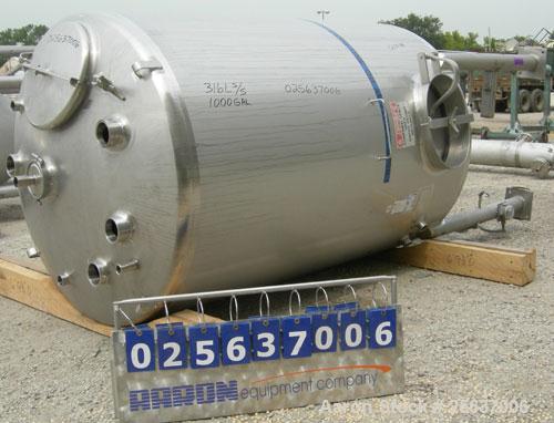 Used Stainless Fabrication Tank, 1,000 Gallon, 316L Stainless Steel, Vertical. 60" diameter x 84" straight side, dished top and bottom. Internal rated to 200 deg F. Openings: top 1-1/2" tri-clamp, (2...