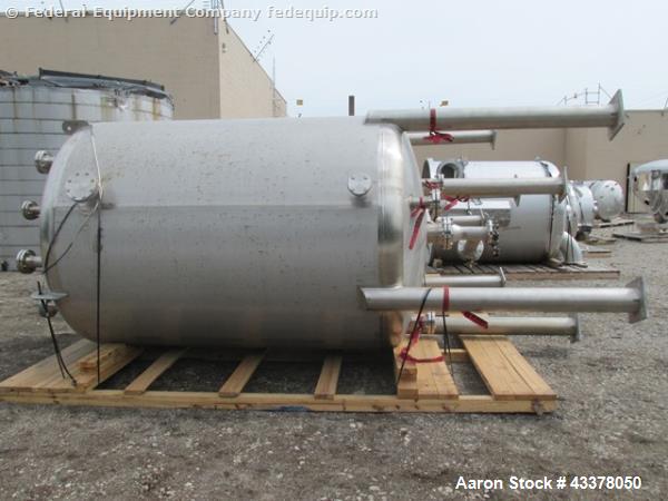 Used Stainless Fab Tank, 2000 Gallon. 316 Stainless steel construction, approximate 78" diameter x 96" straight side, dished top & bottom. Openings top (3) 2”, (8) 3”, 4”, 24” man way. Openings botto...