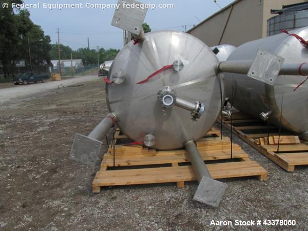 Used Stainless Fab Tank, 2000 Gallon. 316 Stainless steel construction, approximate 78" diameter x 96" straight side, dished top & bottom. Openings top (3) 2”, (8) 3”, 4”, 24” man way. Openings botto...
