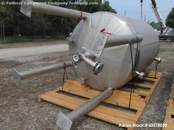 Used Stainless Fab Tank, 2000 Gallon. 316 Stainless steel construction, approximate 78" diameter x 96" straight side, dished top & bottom. Openings top (3) 2”, (8) 3”, 4”, 24” man way. Openings botto...