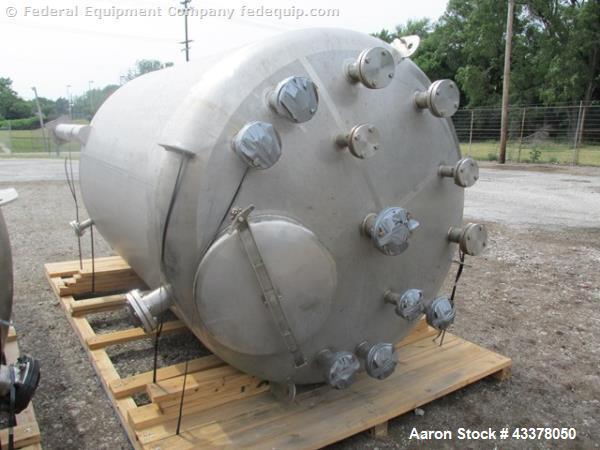 Used Stainless Fab Tank, 2000 Gallon. 316 Stainless steel construction, approximate 78" diameter x 96" straight side, dished top & bottom. Openings top (3) 2”, (8) 3”, 4”, 24” man way. Openings botto...