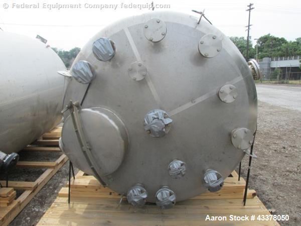 Used Stainless Fab Tank, 2000 Gallon. 316 Stainless steel construction, approximate 78" diameter x 96" straight side, dished top & bottom. Openings top (3) 2”, (8) 3”, 4”, 24” man way. Openings botto...