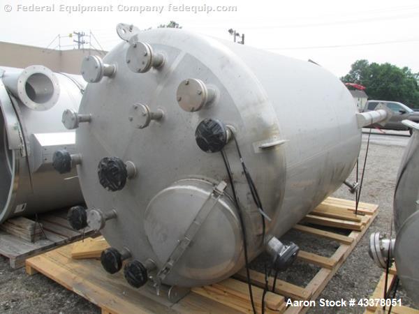Used Stainless Fab Tank, 2000 Gallon. 316 Stainless steel construction, approximate 78" diameter x 96" straight side, dished top & bottom. Openings top (3) 2”, (8) 3”, 4”, 24” man way. Openings botto...
