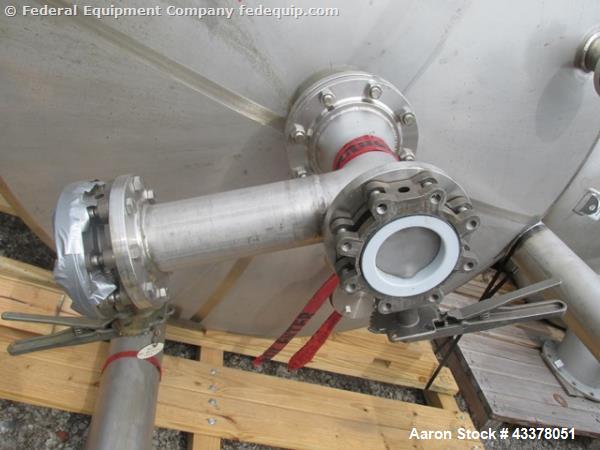 Used Stainless Fab Tank, 2000 Gallon. 316 Stainless steel construction, approximate 78" diameter x 96" straight side, dished top & bottom. Openings top (3) 2”, (8) 3”, 4”, 24” man way. Openings botto...