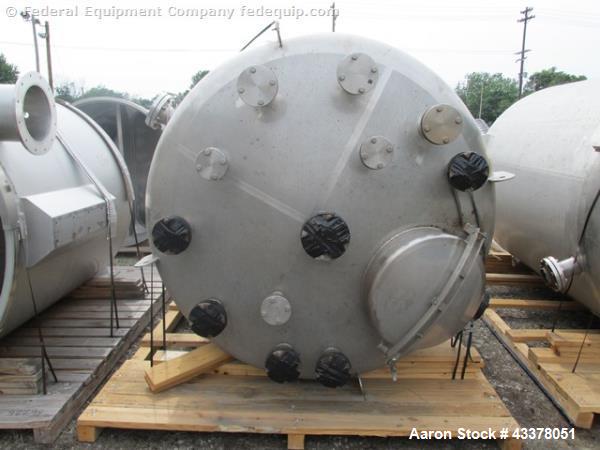 Used Stainless Fab Tank, 2000 Gallon. 316 Stainless steel construction, approximate 78" diameter x 96" straight side, dished top & bottom. Openings top (3) 2”, (8) 3”, 4”, 24” man way. Openings botto...