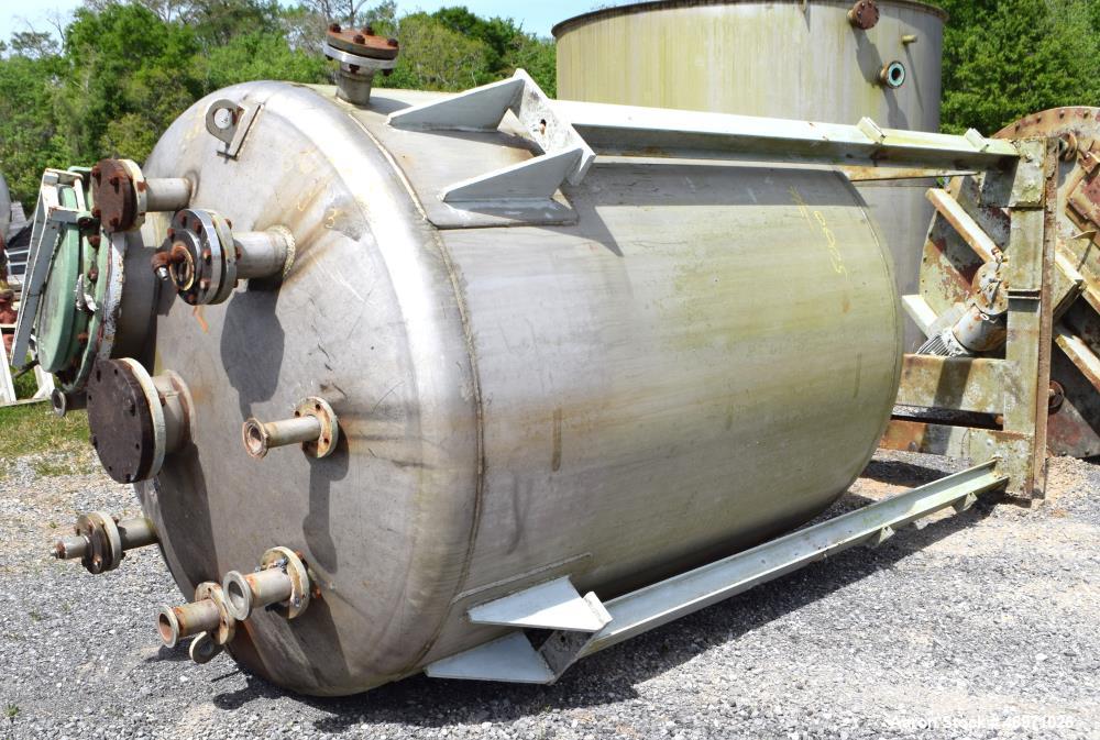 Used TPI Industrial Tank, Approximate 1500 Gallon, Stainless Steel, Vertical. Approximate 72" Diameter x 80" straight side, dished top and bottom. Sidewall baffles, top man way, center bottom outlet....