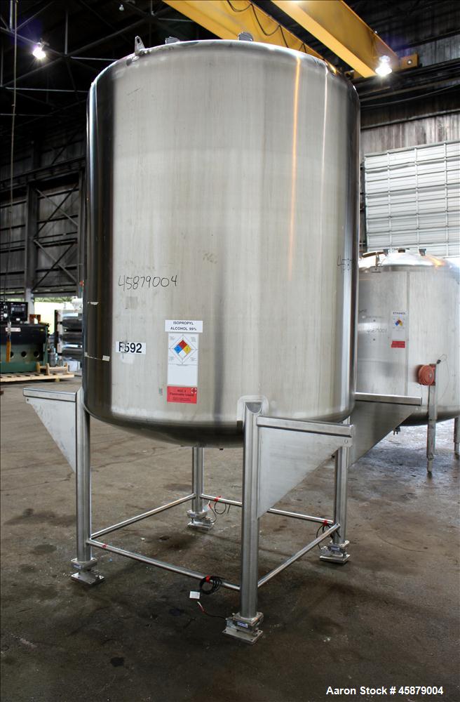 Used T&C Stainless Tank, 1,000 Gallon, 316L Stainless Steel, Vertical. Approximately 65" diameter x 70" straight side. Dished top and bottom. Internal rated 5.25 psi at 250 degrees F. Top opening: 19...