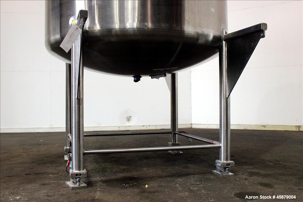 Used T&C Stainless Tank, 1,000 Gallon, 316L Stainless Steel, Vertical. Approximately 65" diameter x 70" straight side. Dished top and bottom. Internal rated 5.25 psi at 250 degrees F. Top opening: 19...