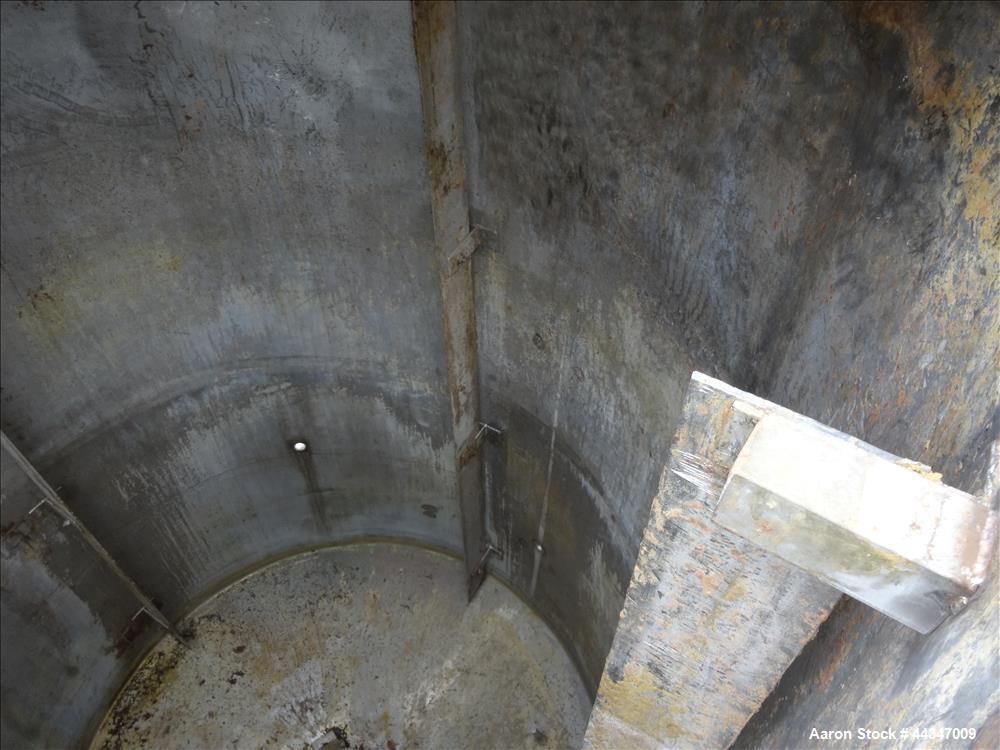 Used United Utensils Tank, 1500 Gallon, 304 Stainless Steel, Vertical. Approximate 67" diameter x 100" straight side. Open top with hinged cover, coned bottom. Approximate 3" center bottom outlet, se...